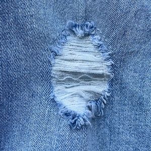 Rip and repair mid-rise skinny jeans